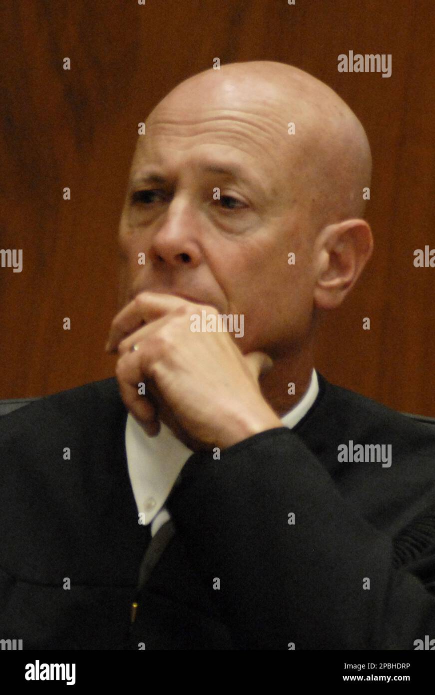 Judge Larry Paul Fidler listens to witness testimony during music ...