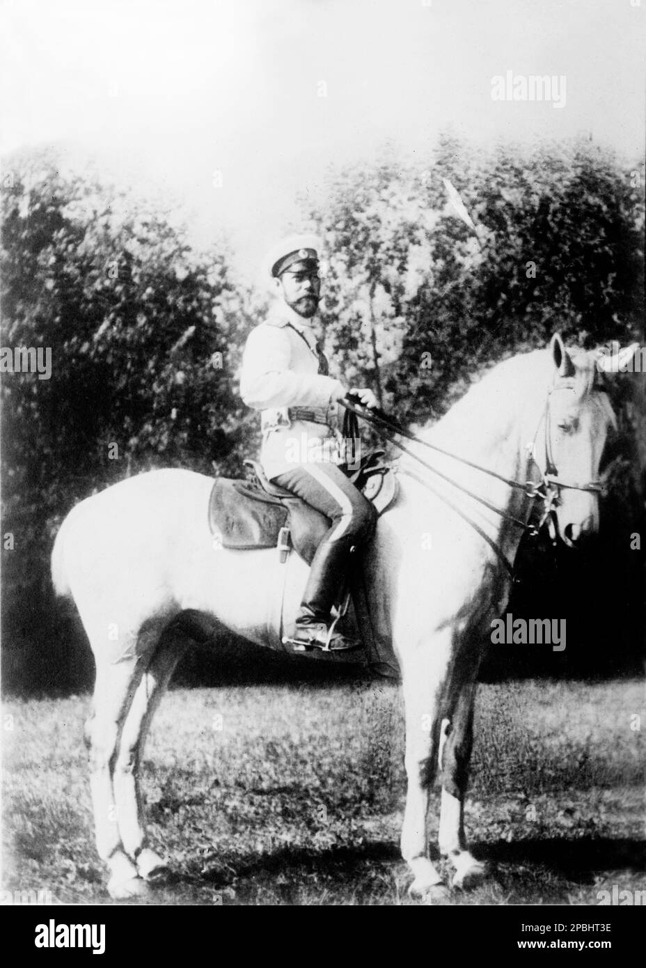 1915 ca : The russian Tsar Nicholas II of Russia ( May 18, 1868–J uly 17, 1918) ( Nikolay II) on horseback . Was the last Emperor of Russia, King of Poland and Grand Duke of Finland . He ruled from 1894 until his forced abdication in 1917 .  Nicholas proved unable to manage a country in political turmoil and command its army in World War I . His rule ended with the Russian Revolution of 1917, after which he and his family were executed by Bolsheviks .  Subsequent to his canonization, he has been regarded as Saint Nicholas The Passion Bearer by the Russian Orthodox Church. - foto storiche - fot Stock Photo