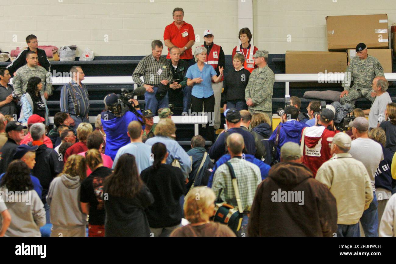 Kansas Gov. Kathleen Sebelius talks to storm survivors at a shelter in