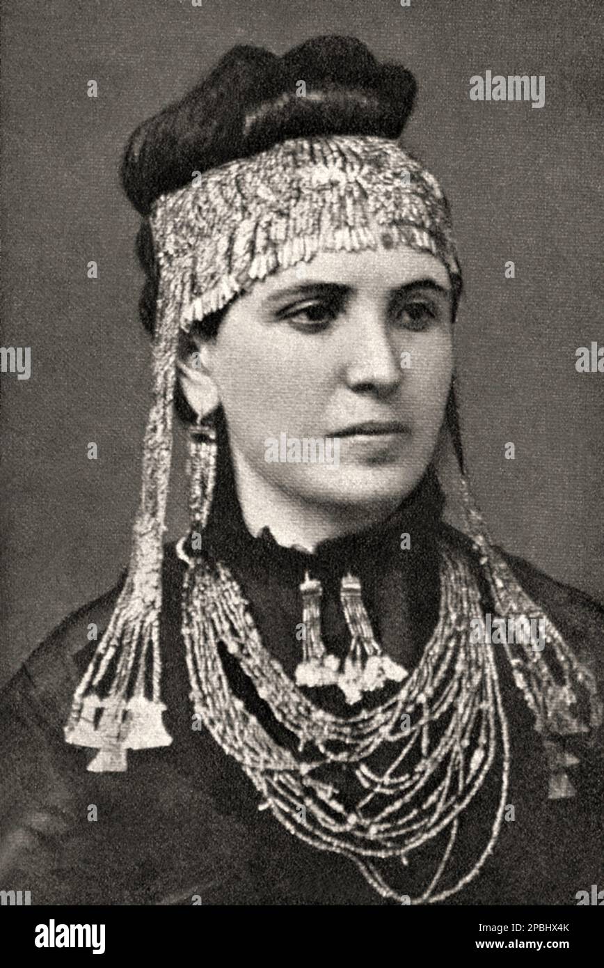 Sophia Schliemann ( born Engastromenos ) wearing treasures recovered at Hisarlik. Married with the german archeologist HEINRICH SCHLIEMANN ( 1822 in Neubukow, Mecklenburg-Schwerin -  1890 in Naples , Italy ), a German treasure hunter, an advocate of the historical reality of places mentioned in the works of Homer, and an important excavator of Troy and of the Mycenaean sites Mycenae and Tiryns . - FOTO STORICHE - HISTORY - OMERO - TROIA - MICENE - GEOGRAFIA - GEOGRAPHY  - ARCHITETTURA - ARCHITECTURE - ROME - ARCHEOLOGIA - ARCHEOLOGY - gioiello - gioielli - jewellery - jewels - gold - oro - nec Stock Photo