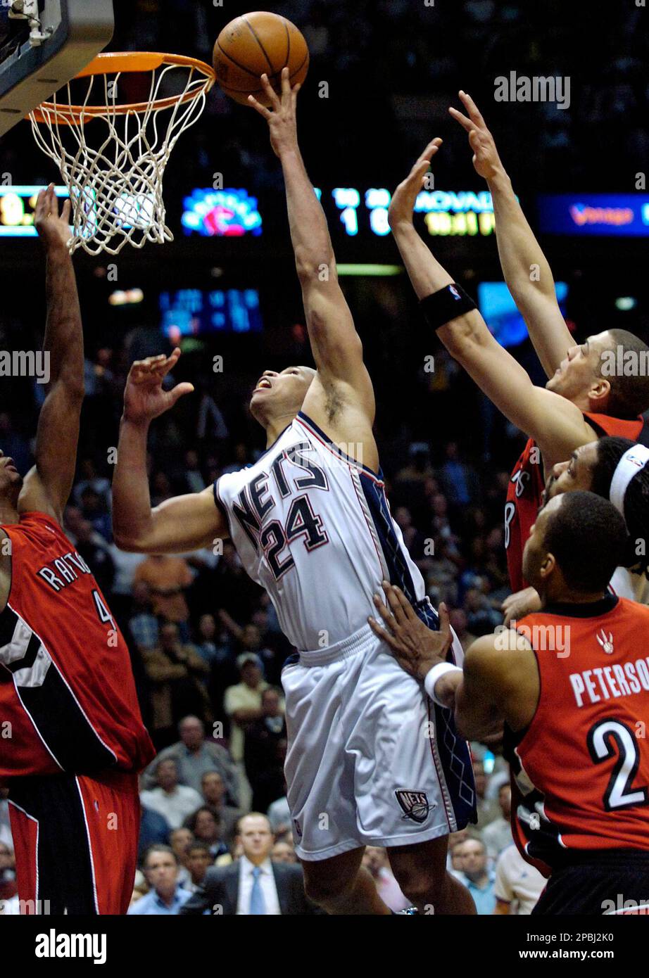 Cleveland Cavaliers' LeBron James takes a shot against New Jersey Nets' Richard  Jefferson during the first half at Quicken Loans Arena in Cleveland, Ohio,  Wednesday, February 1, 2006. (Photo by Ken Love/Akron