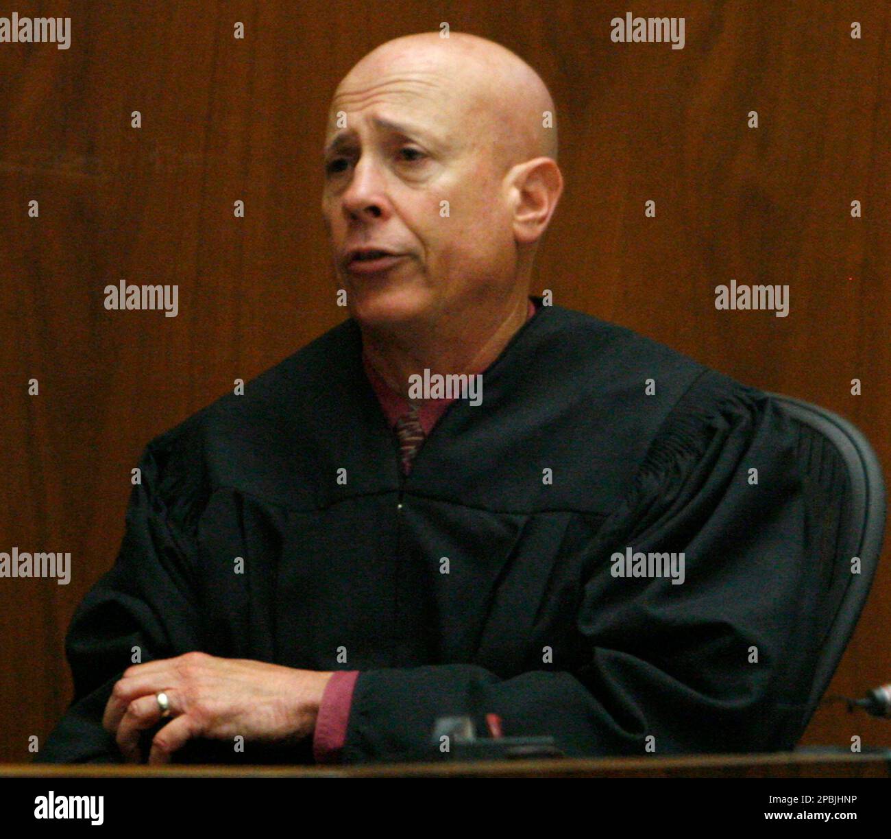 Superior Court Judge Larry Paul Fidler addresses jurors during the ...