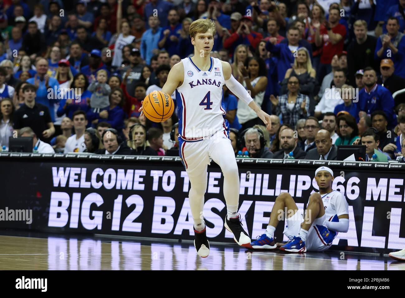 KANSAS CITY, MO - MARCH 11: Kansas Jayhawks guard Gradey Dick (4) brings  the ball up court in the first half of the Big 12 basketball tournament  championship game between the Texas