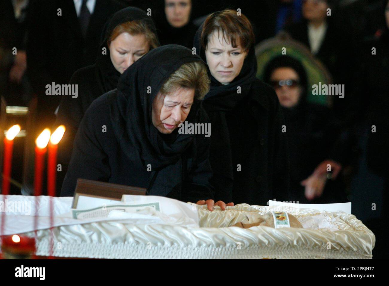 The widow of former Russian president Boris Yeltsin, Naina, center,and ...