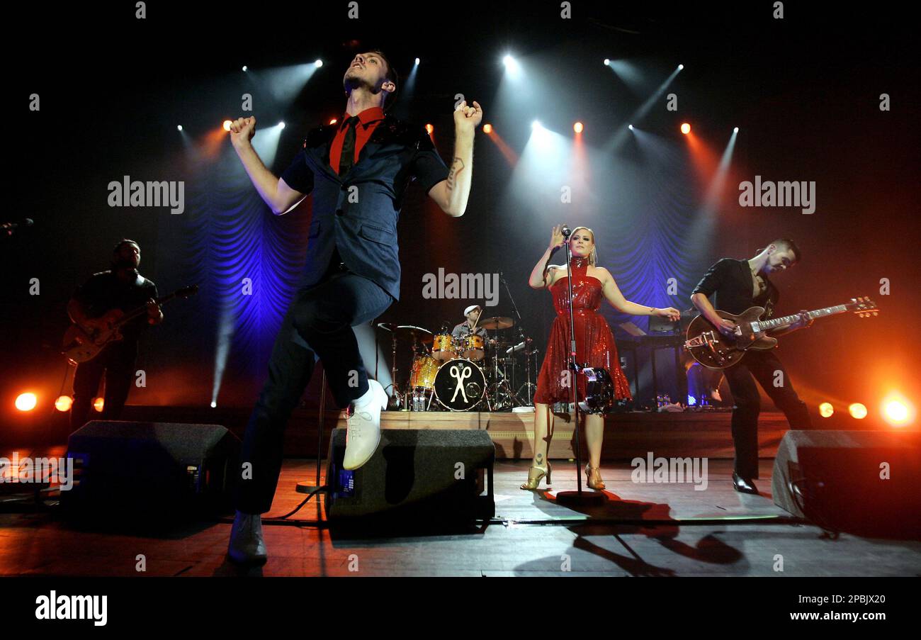 Scissor Sisters singer Jake Shears, foreground, performs during the