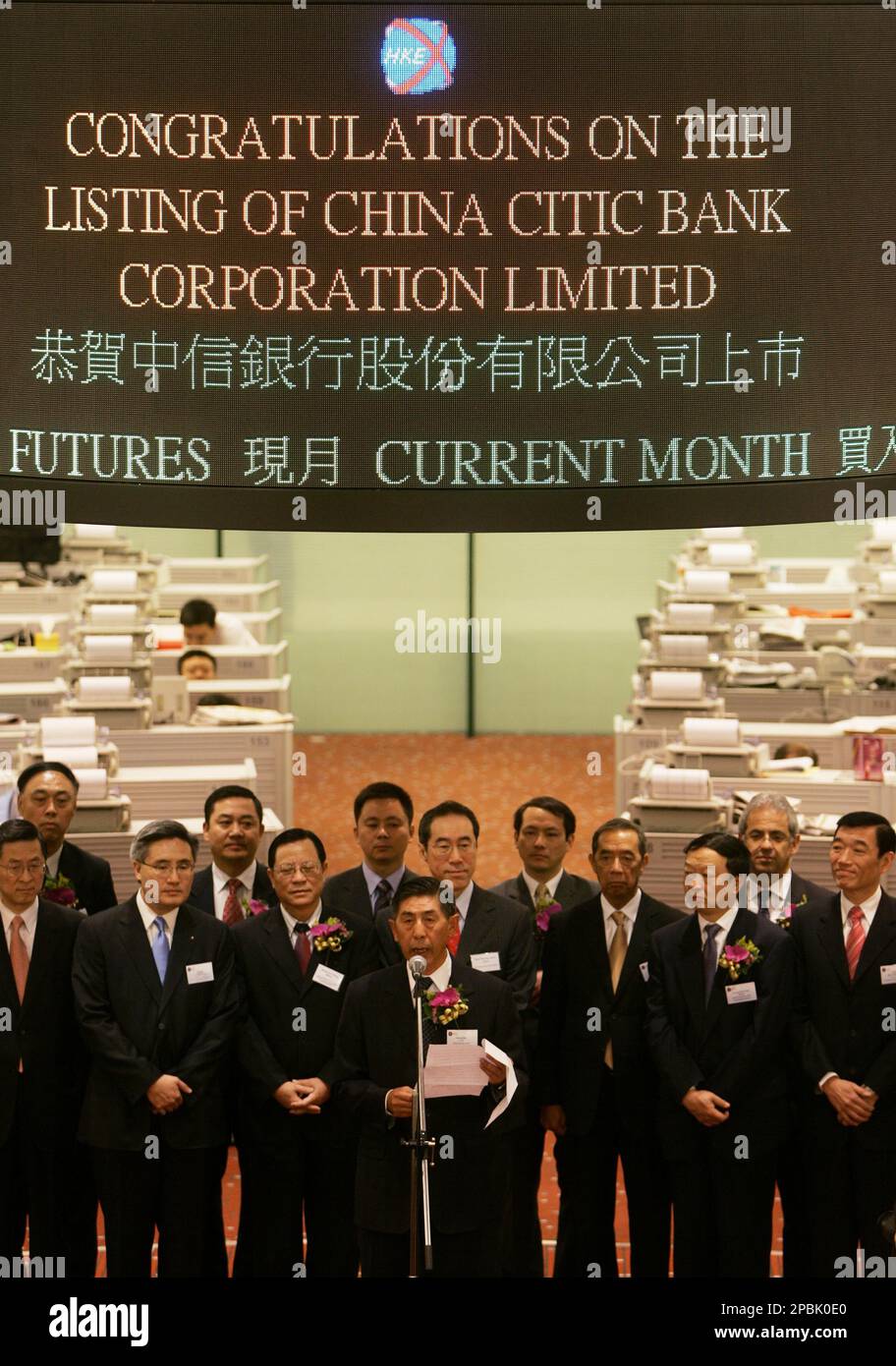 Kong Dan, center, chairman of China Citic Bank Corp. Ltd., announces the  listing of initial public offering of the bank at the Hong Kong Stocks  Exchange Friday, April 27, 2007. Shares in