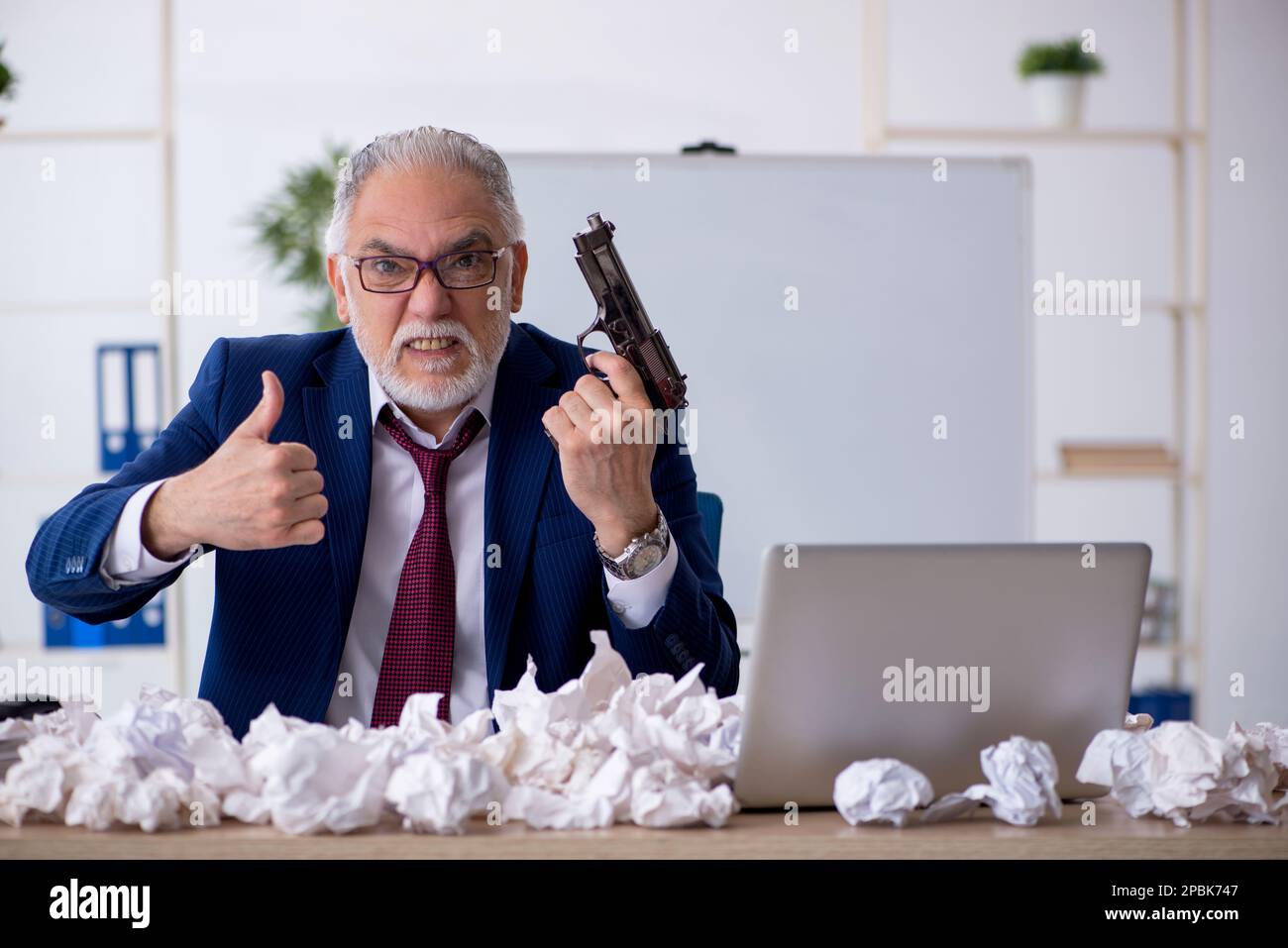 Old businessman employee in brainstorming concept Stock Photo