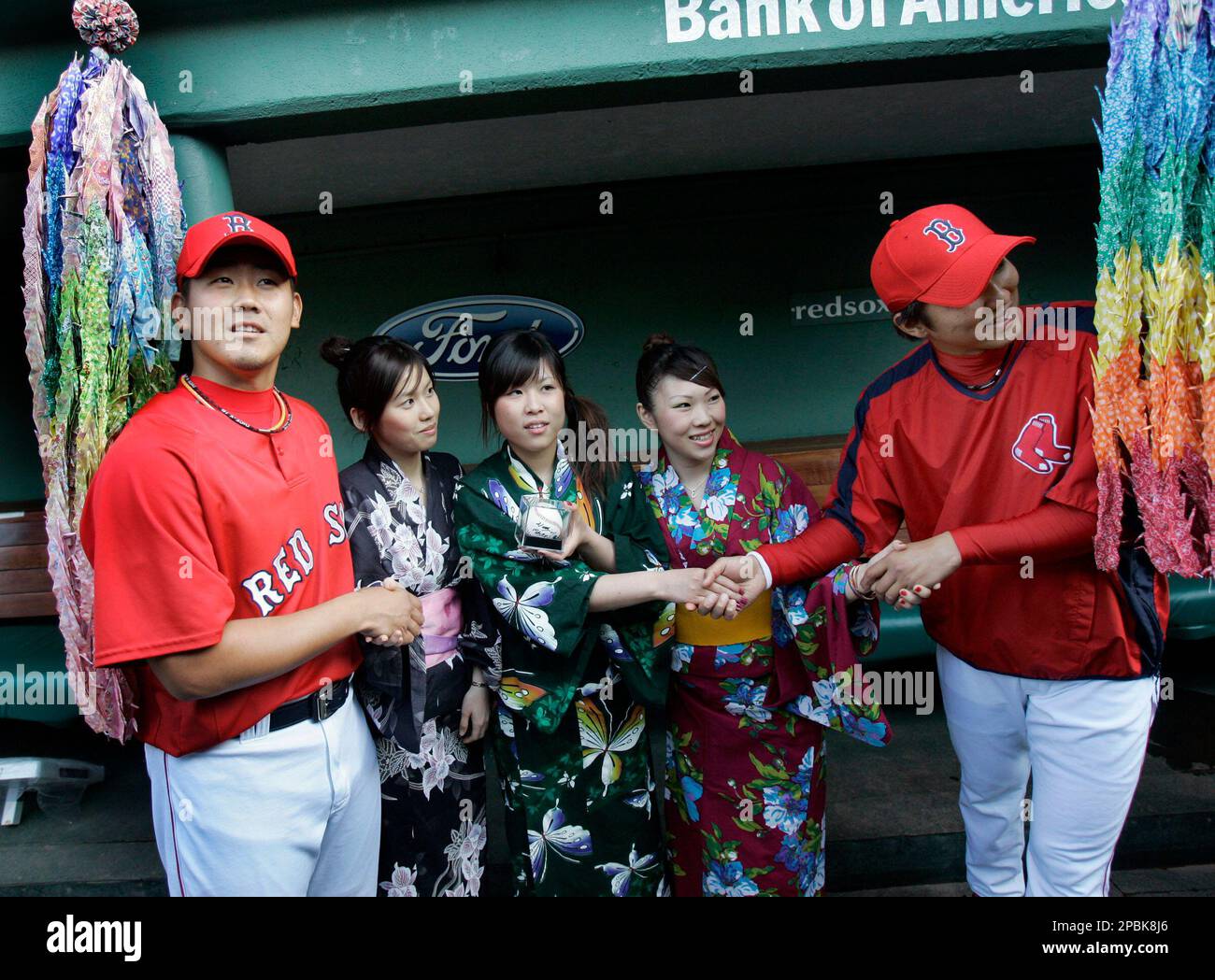 Boston Red Sox pitchers Daisuke Matsuzaka, left, and Hideki Okajima