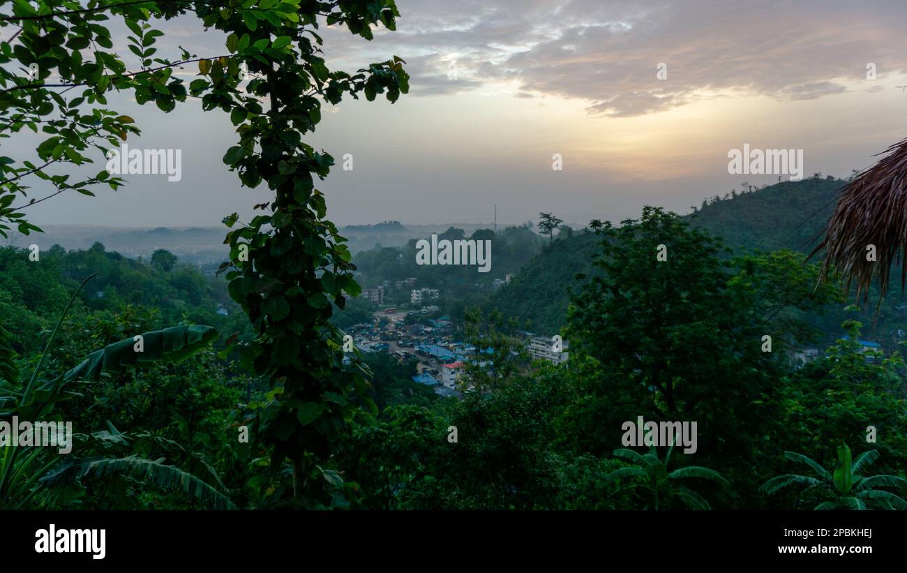 Beautiful scenery in the mountains. Hilly region of Bangladesh. early morning sky Some parts of Bandarban city from above. Photo taken from Meghbari, Stock Photo