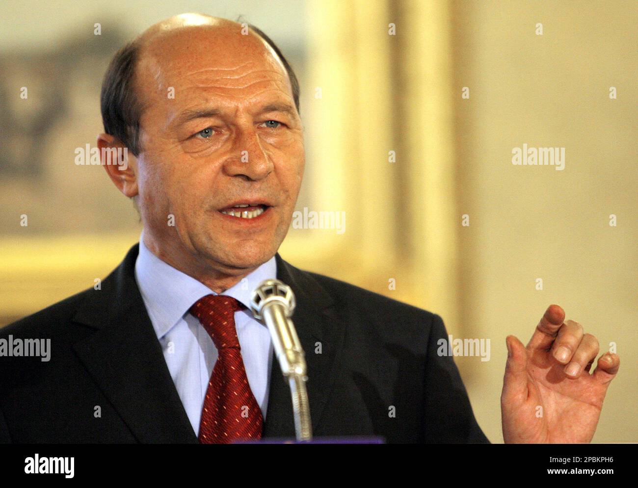 Romania's suspended President Traian Basescu delivers a statement in Bucharest, Romania Friday April 20, 2007. Basescu said Friday he would not resign, a day after he was suspended by Romania's parliament pending an impeachment referendum amid opposition allegations that he abused his position. (AP Photo/Vadim Ghirda) Stock Photo