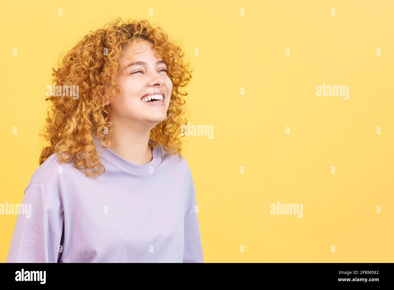 Curly hair woman happy hi-res stock photography and images - Alamy
