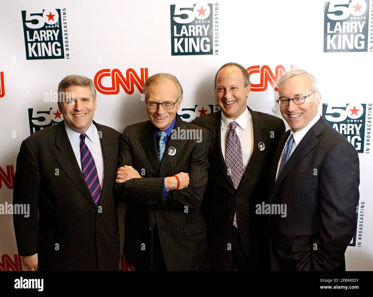 from left to right philip kent chairman and ceo of turner broadcasting system inc larry king jim walton president of cnn worldwide and jon klein president of cnnus stand together at a party held by cnn celebrating kings fifty years of broadcasting new york wednesday april 18 2007 ap photostuart ramson 2PBM0DY