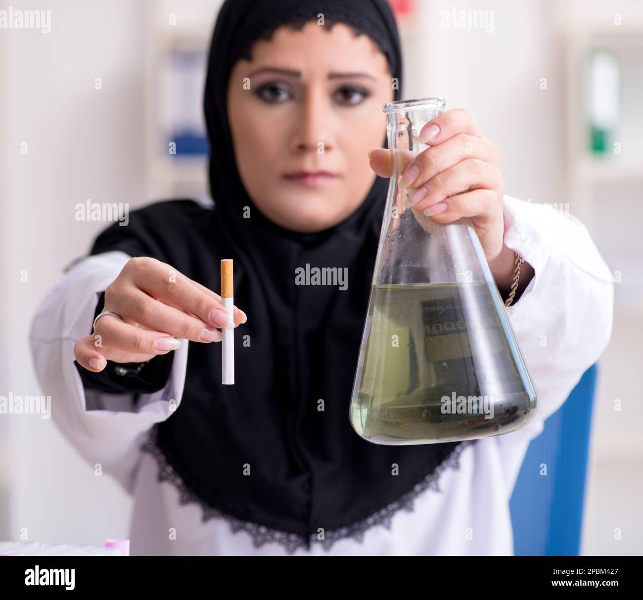 The female chemist in hijab working in the lab Stock Photo Alamy