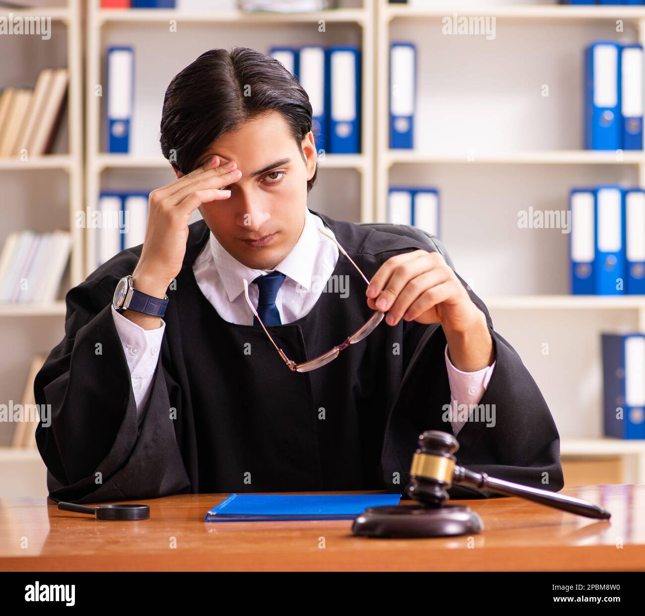The young handsome judge working in court Stock Photo