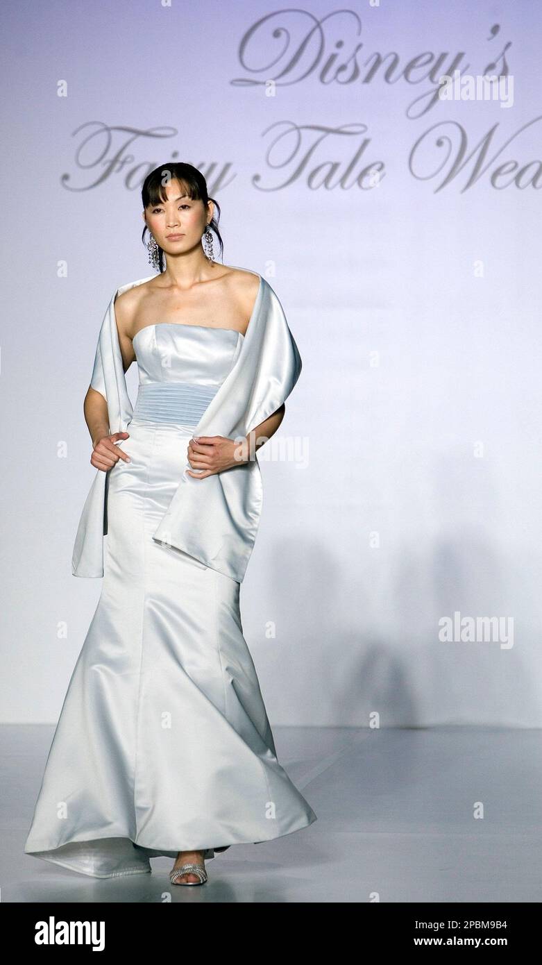 FOR USE WITH AP WEEKLY FEATURES ** A model walks the runway showing Kirstie  Kelly for Disney's Fall Fairy Tale Weddings dresses Sunday, April 15, 2007  in New York City. The