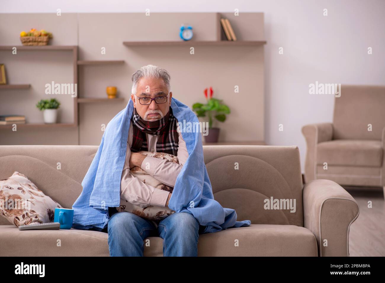 Sick old man coughing sitting hi-res stock photography and images - Alamy