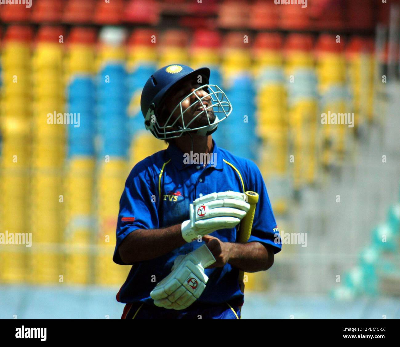 Indian cricketer Dinesh Karthik, playing for Tamil Nadu reacts as he is ...