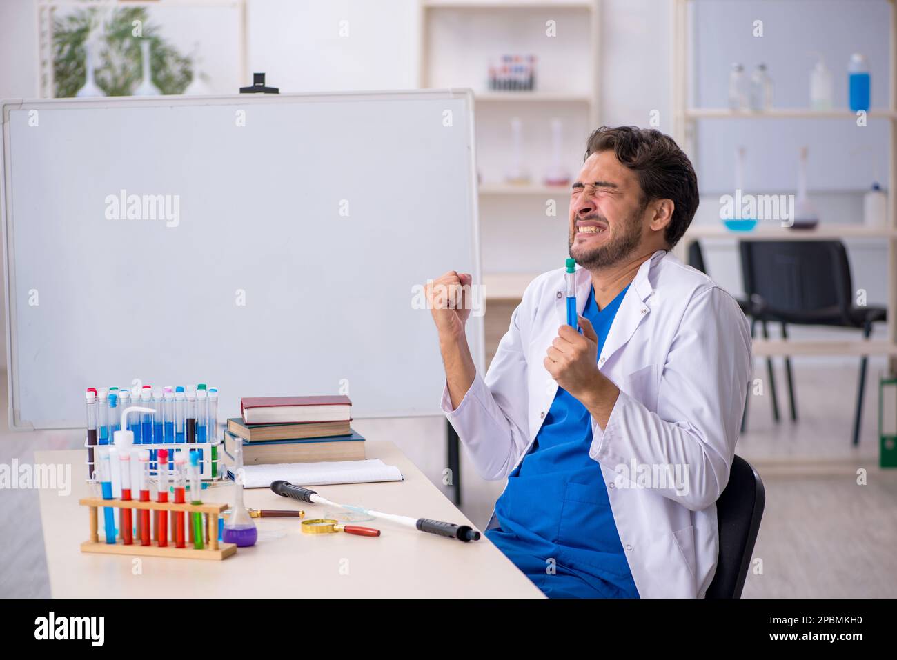 Young chemist working at the lab Stock Photo