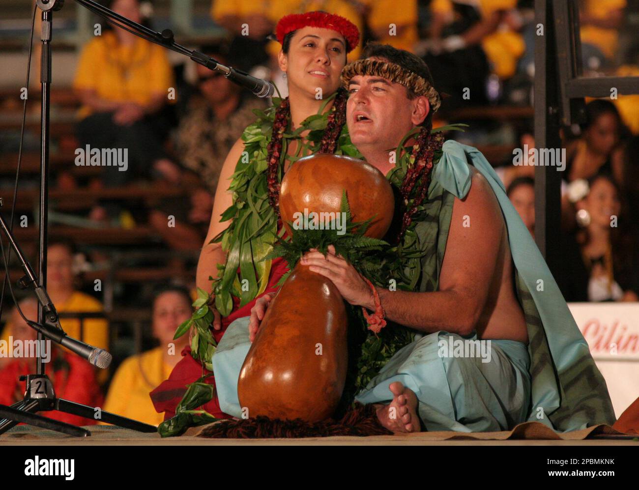 Hula teacher Manu Boyd chants Thursday night, April 12, 2007, during