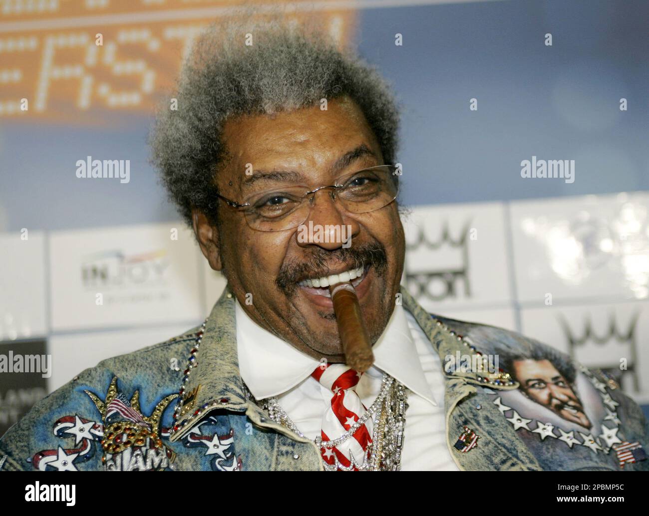 us-box-promoter-don-king-smiles-with-a-cigar-between-his-teeth-during-a-press-conference-for-the-wba-heavyweight-world-championship-fight-between-current-world-champion-nikolai-valuev-from-russia-and-his-challenger-ruslan-chagaev-from-uzbekistan-in-stuttgart-southwestern-germany-thursday-april-12-2007-the-fight-will-take-place-in-stuttgart-on-saturday-april-14-2007-ap-photothomas-kienzle-2PBMP5C.jpg
