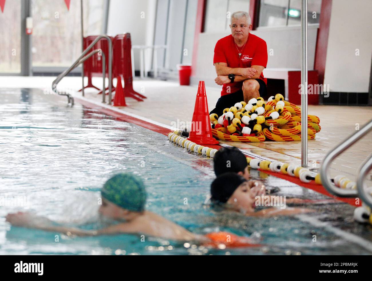 Essen, Germany. 09th Mar, 2023. Swimming supervisor Enrique Gonzalez watches the action in the pool at the Thurmfeld Sports Pool. The pools are looking for staff for the outdoor pool season. If the required 50 lifeguards are missing in the summer, many outdoor pools could remain closed. (to dpa: 'When the lifeguard is missing - outdoor pools are looking for staff for the summer') Credit: Roland Weihrauch/dpa/Alamy Live News Stock Photo