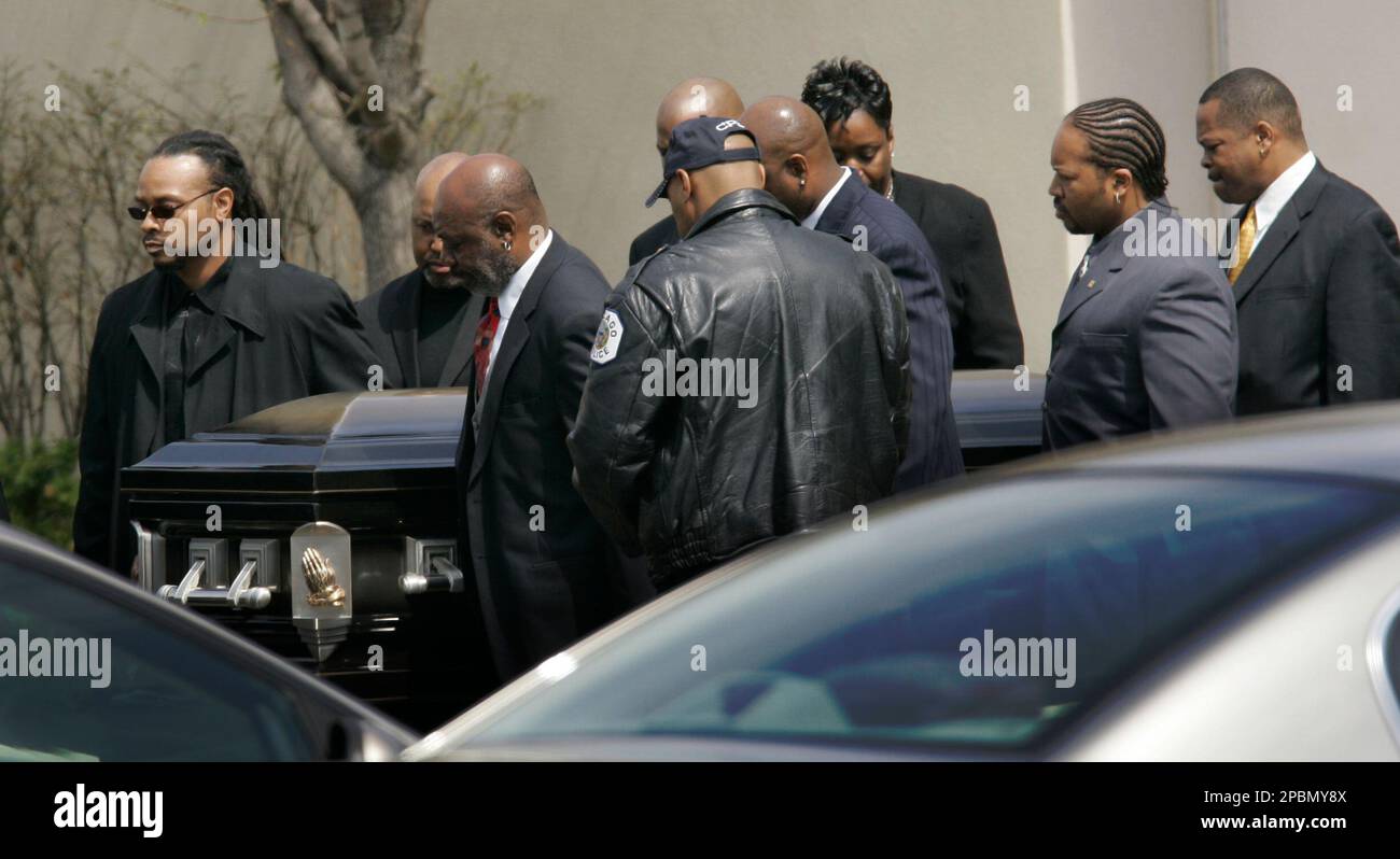The coffin carrying the body of former New England Patriots player