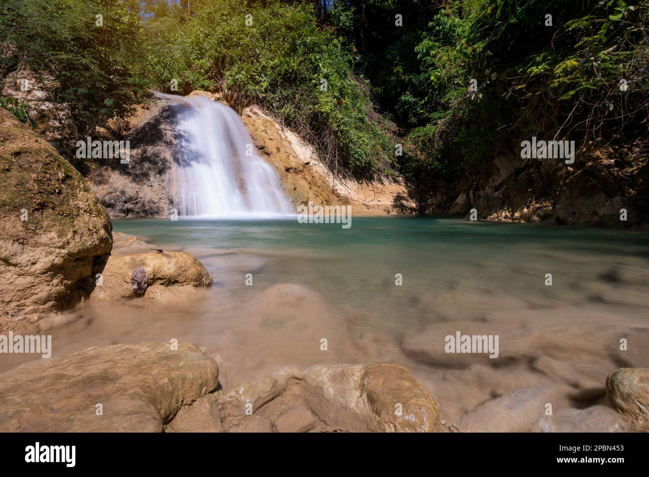 Scenic view of a cool refreshing waterfall. Stock Photo