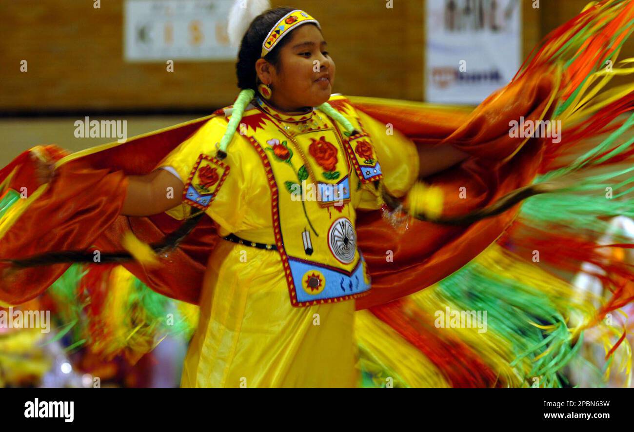 Natasha Watson, 12, of Fort Hall, Idaho, performs a fancy shawl dance