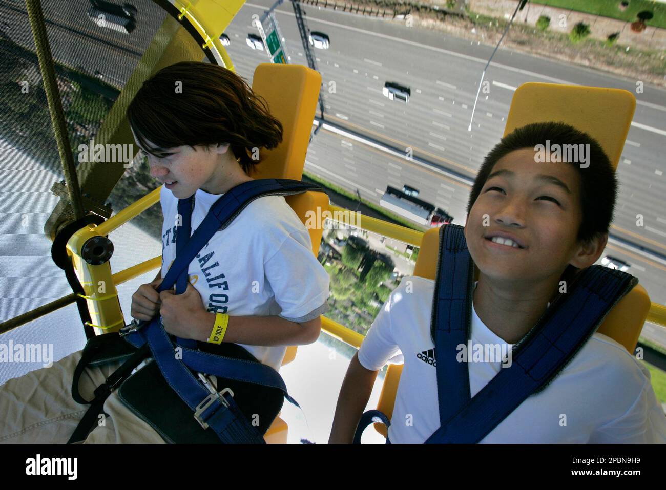 https://c8.alamy.com/comp/2PBN9H9/nick-modar-11-left-and-liam-olson-kenny-12-right-go-inverted-while-riding-the-screamer-at-the-scandia-family-fun-center-in-sacramento-calif-friday-april-6-2007-the-165-foot-tall-windmill-ride-has-caused-some-neighbors-to-complain-about-the-screams-of-its-riders-forcing-the-park-to-institute-a-policy-of-complete-silence-ap-photorich-pedroncelli-2PBN9H9.jpg