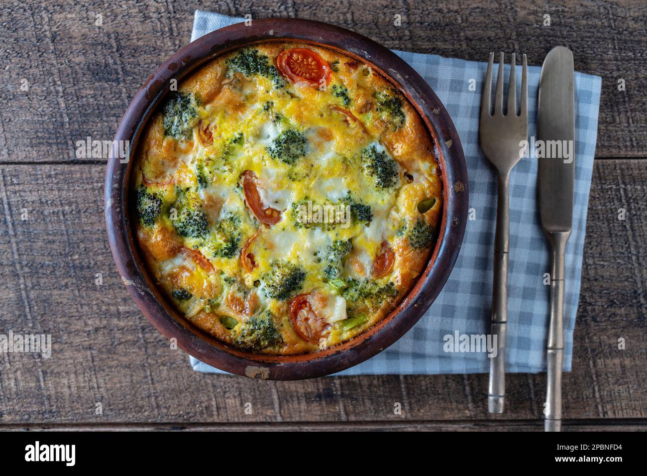 Ceramic bowl with vegetable frittata, simple vegetarian food. Frittata