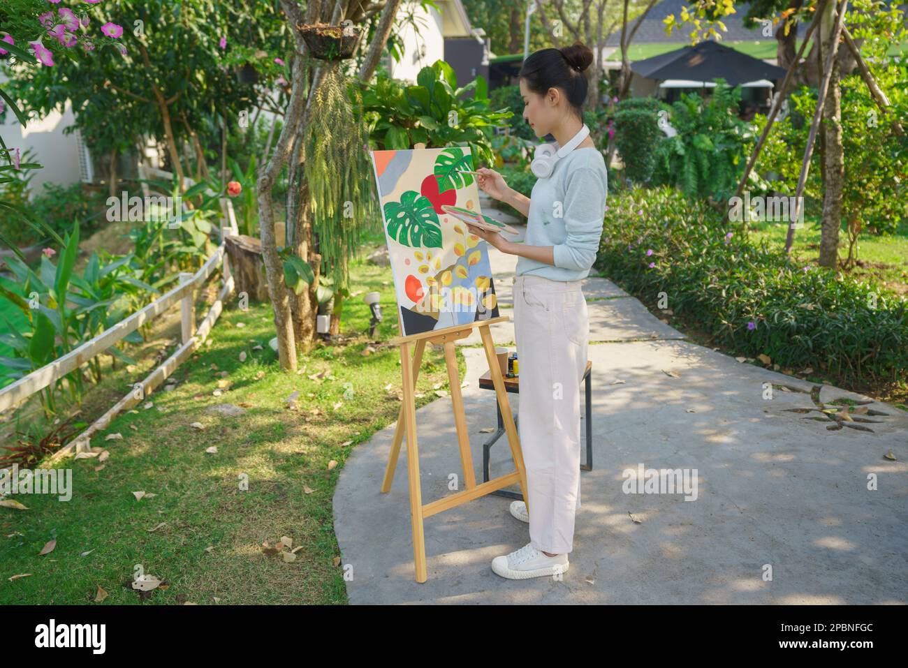 Creative art concept, Female artist holding color palette and painting ...