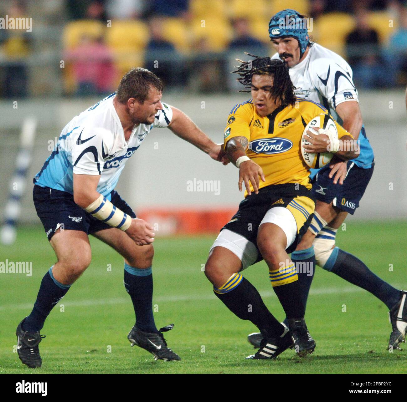 South African Bulls Rayno Gerber, left, attempts to grab New Zealand Hurricanes Maa Nonu in the Super 14 rugby match at Westpac Stadium, Wellington, New Zealand, Saturday, March 31, 2007