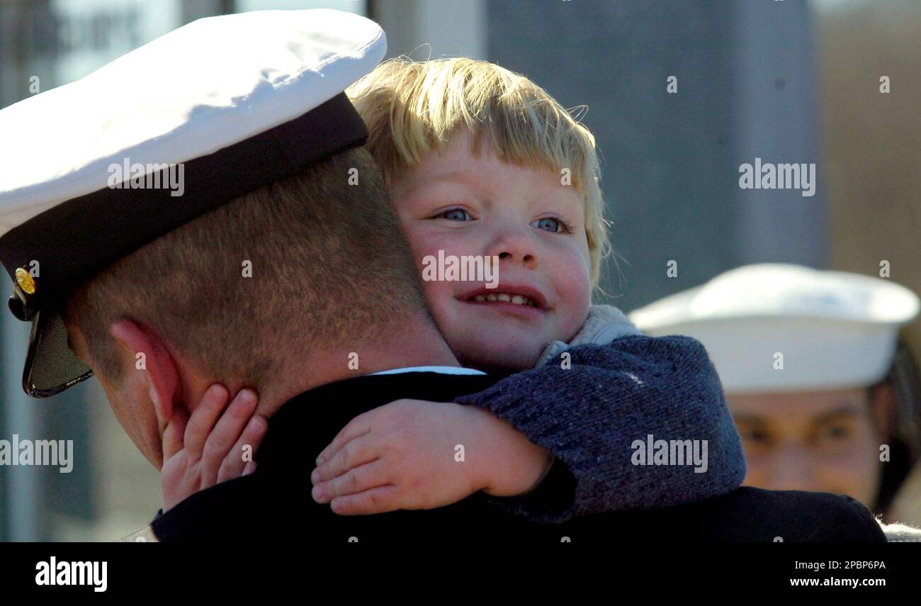 Teak Sturgill 3 of Waterford Conn. embraces his father Joshua