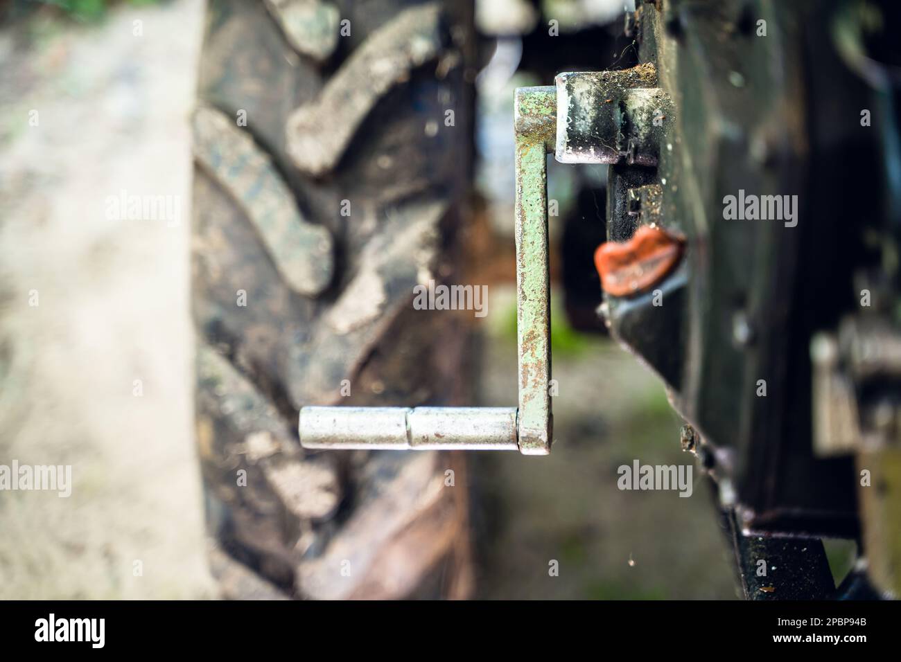 Crooked starter for starting the engine of a walkbehind tractor closeup. Mechanism for manual