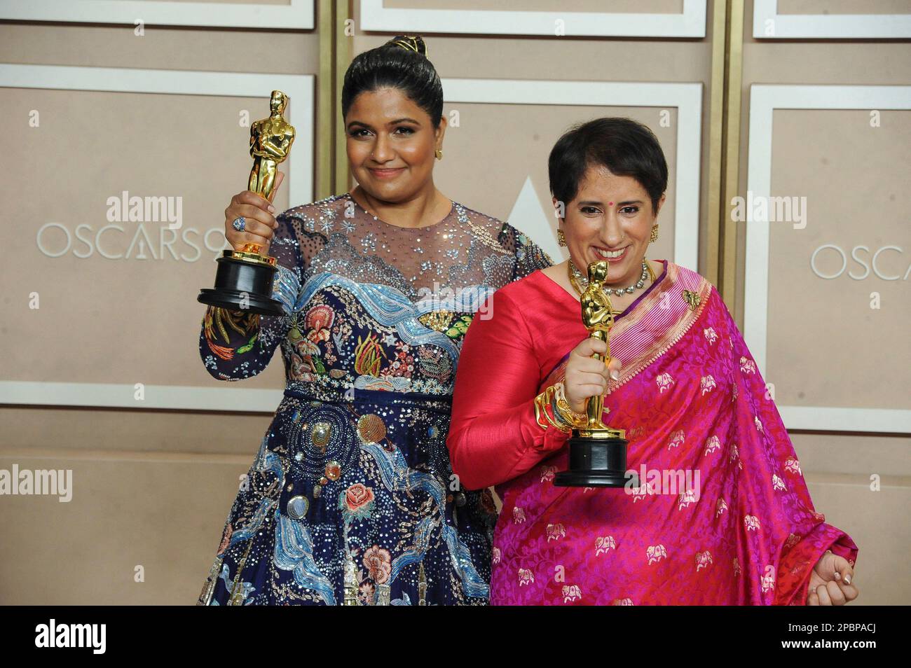 Los Angeles, CA. 12th Mar, 2023. Kartiki Gonsalves, Guneet Monga in the press room for 95th Academy Awards - Photo Room, Dolby Theatre, Los Angeles, CA March 12, 2023. Credit: Elizabeth Goodenough/Everett Collection/Alamy Live News Stock Photo