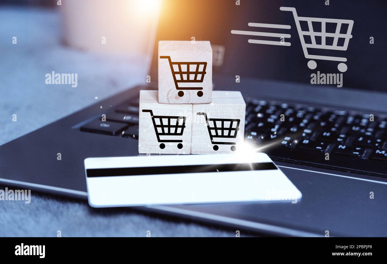 credit card filling billing information on laptop computer shopping in