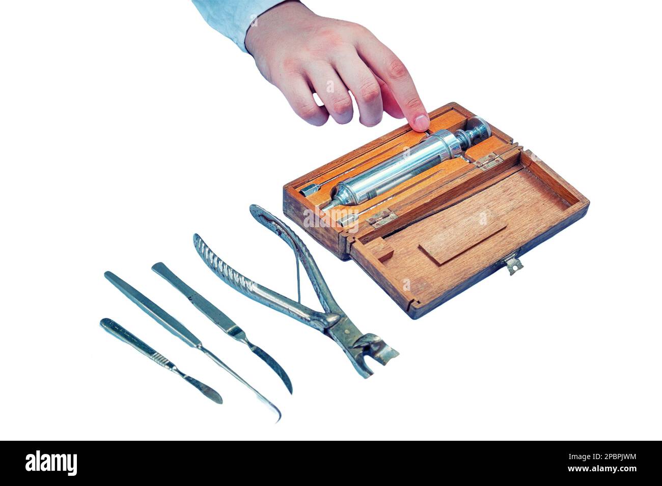 Ancient hospital for treatment soldiers on battlefield - 18th or 19th century, isolated on a white background. Forceps, syringe, scissors, scalpel and Stock Photo