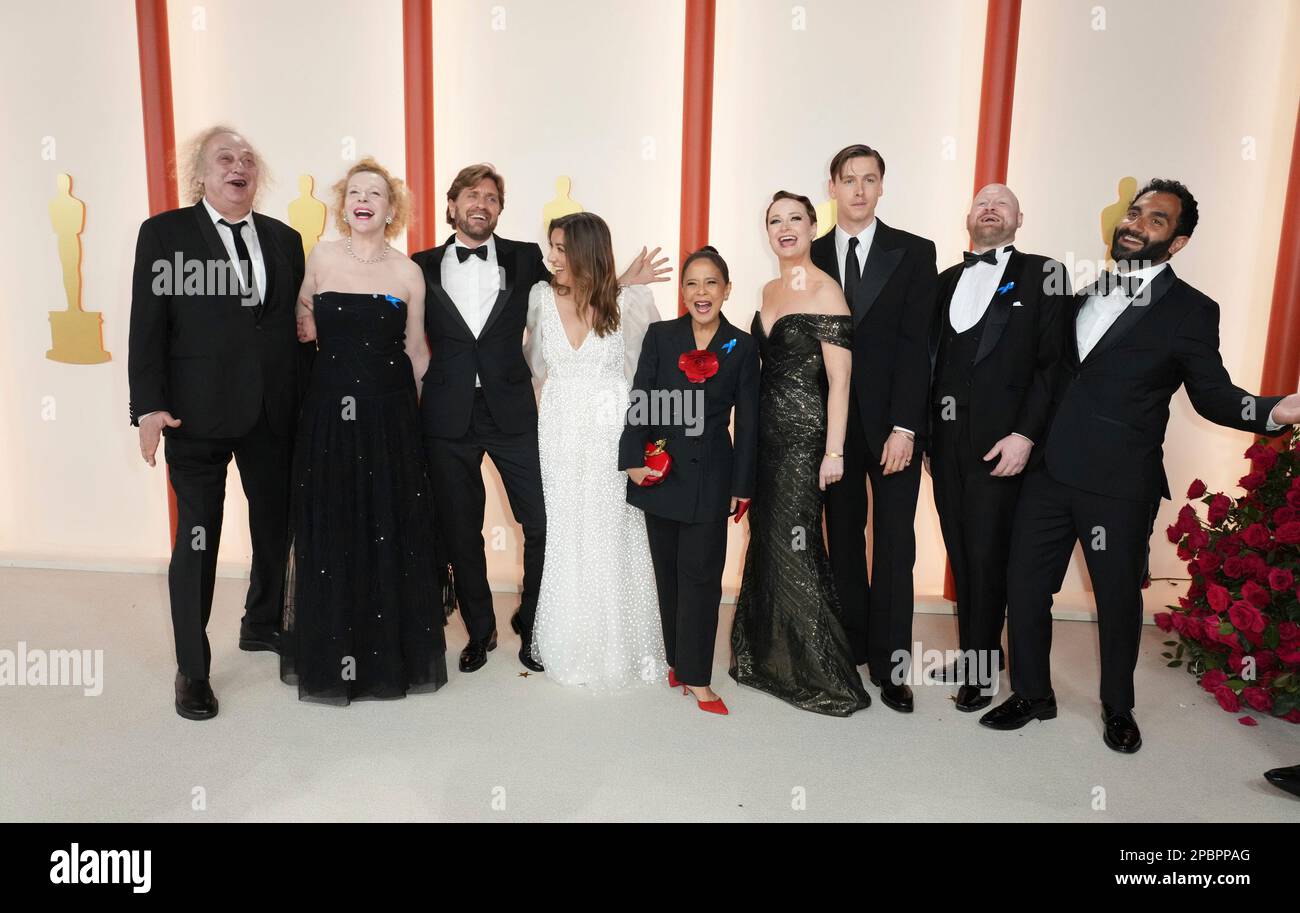The team from "Triangle of Sadness" arrives at the Oscars on Sunday, March 12, 2023, at the