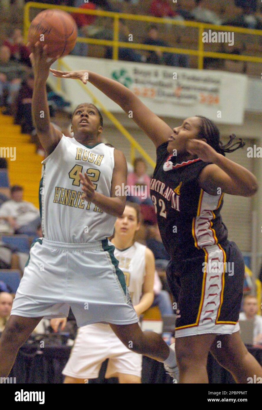 RushHenrietta's Shenise Johnson (42) goes up for a shot against Murry