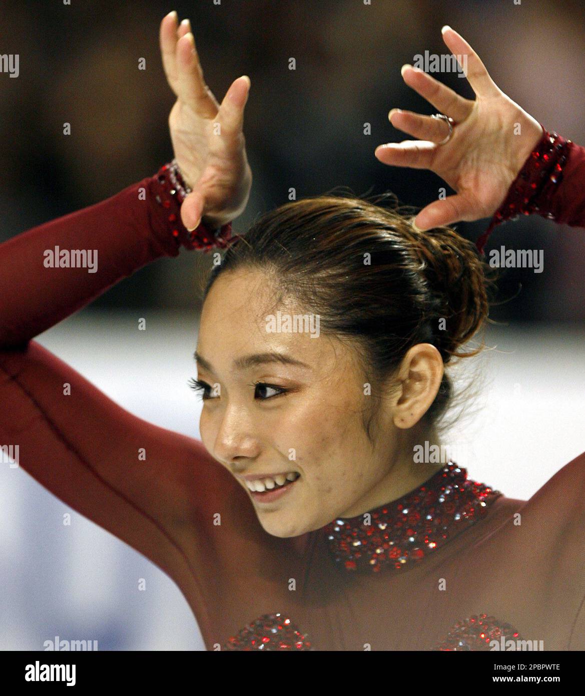 Miki Ando Of Japan Smiles During Her Performance In The Women s Free miki-ando-of-japan-smiles-during-her-performance-in-the-women-s-free
