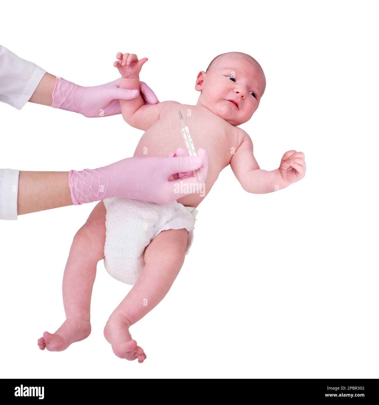 Doctor checks the temperature of the newborn baby with a thermometer