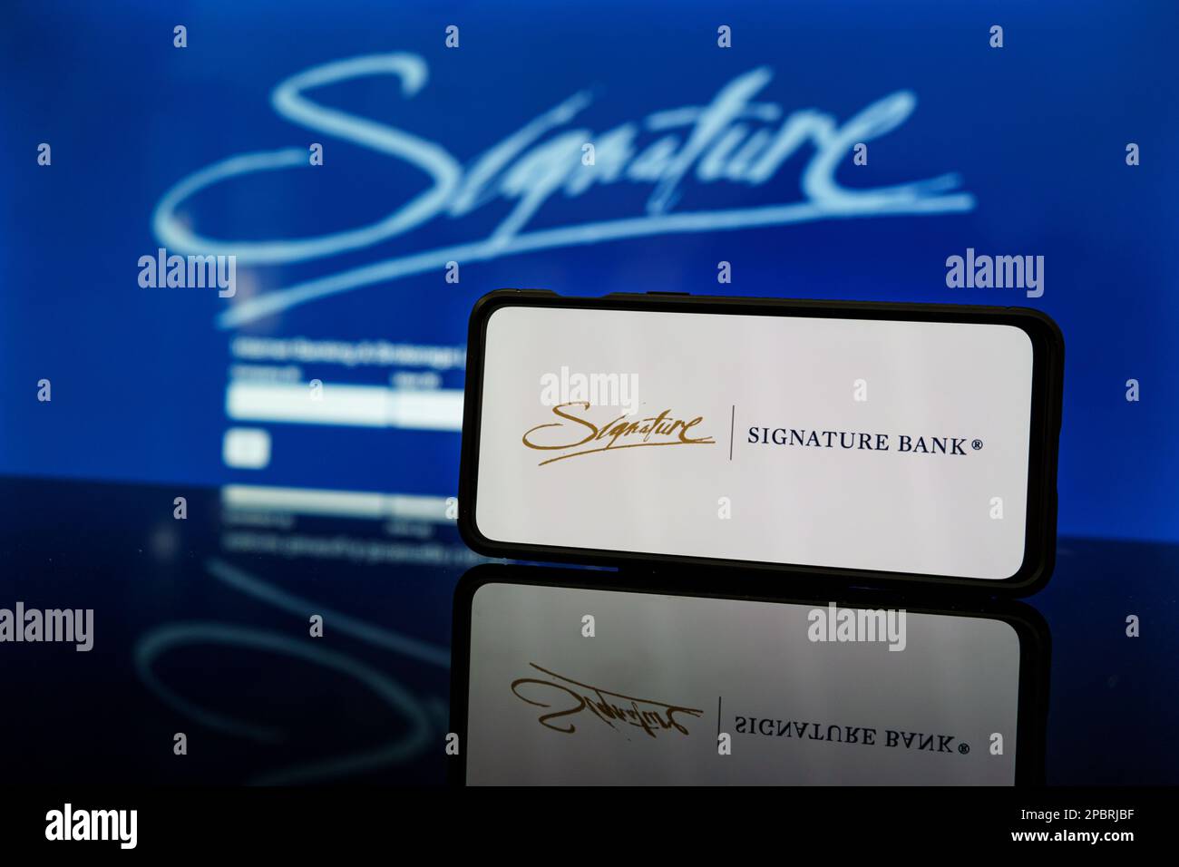 New York, United States of America - 2023 March 13: Signature bank logo and website on screen. American Siganture bank collapse. Bank goes bankrupt. H Stock Photo