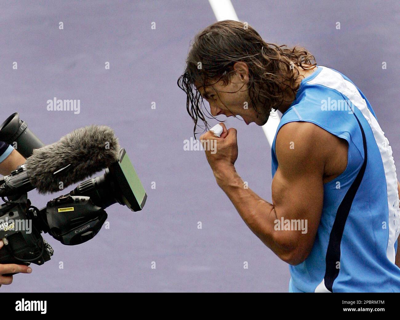 Rafael Nadal of Spain reacts to a TV camera after defeating Andy Roddick of the USA, 6-4, 6-3, in their semifinal match at the Pacific Life Open tennis tournament in Indian Wells,