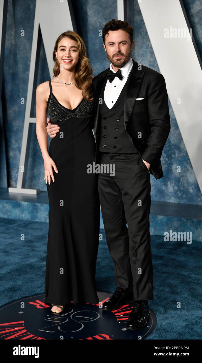 Caylee Cowan, left, and Casey Affleck arrive at the Vanity Fair Oscar