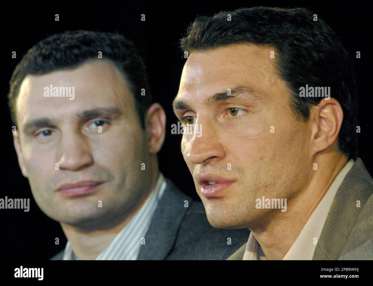 Former WBC heavyweight boxing champion Vitali Klitschko, left, and his