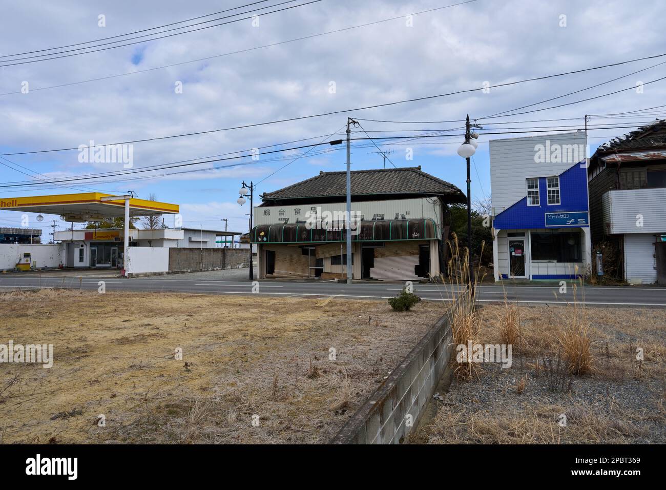 (230313) -- FUKUSHIMA, March 13, 2023 (Xinhua) -- This photo taken on March 6, 2023 shows abandoned houses in Futabacho, Futabagun of Fukushima Prefecture in Japan. Struck by a magnitude-9.0 earthquake and ensuing tsunami that hit Japan's northeast on March 11, 2011, the power plant suffered core meltdowns, resulting in a level-7 nuclear accident, the highest on the International Nuclear and Radiological Event Scale. Twelve years after the 2011 accident traumatized Fukushima's fishing industry, local fishermen are still struggling for recovery. As Japan pushes ahead with dumping tons of con Stock Photo