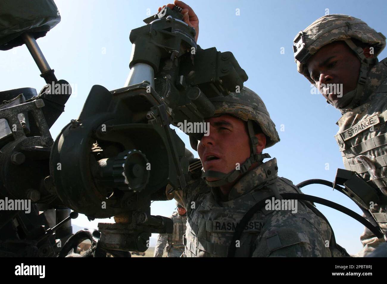 U.S soldiers of 82nd Airborne looks through artillery gun patrols near ...