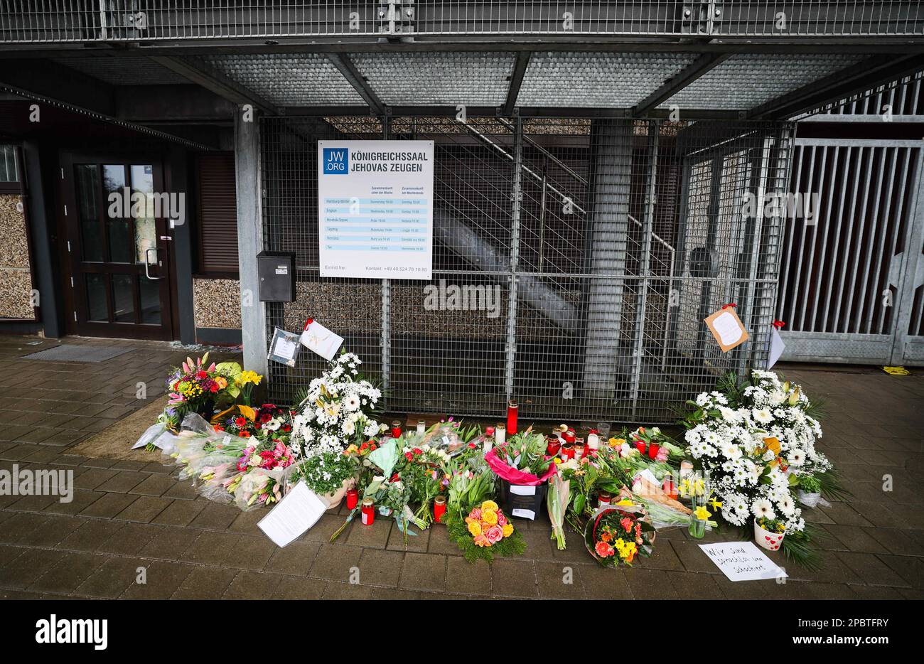 Hamburg, Germany. 13th Mar, 2023. Flowers and candles in front of the