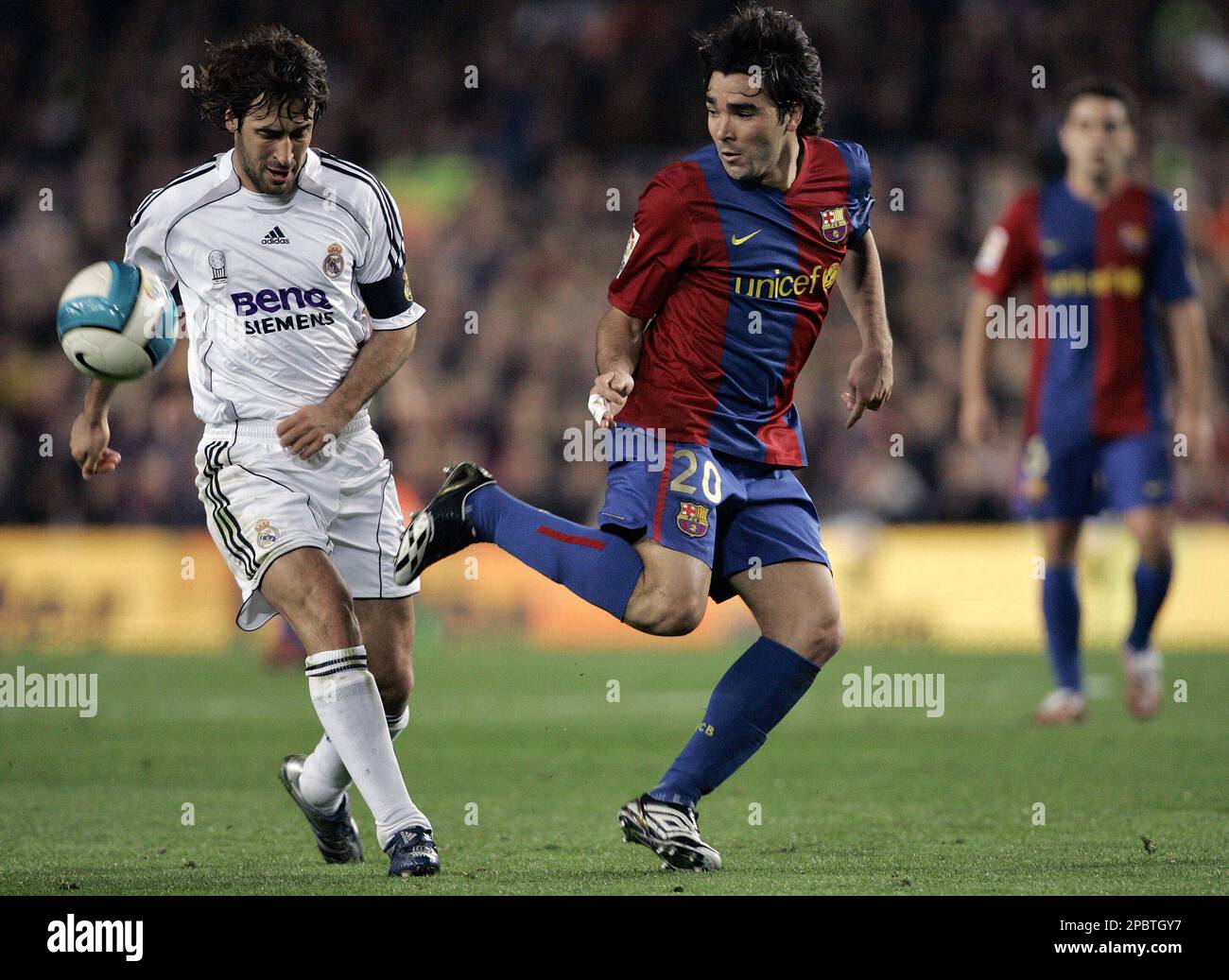 FC Barcelona player Deco, right, from Portugal duels for the ball