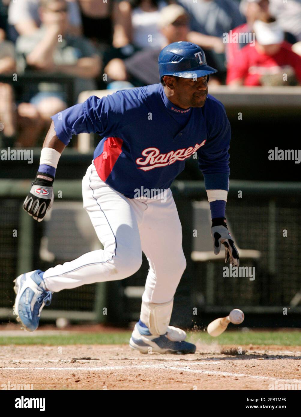 Texas Rangers' Sammy Sammy Sosa watches his single in the second inning on  a pitch from Chicago Cubs' Neal Cotts during a spring training baseball  game in Surprise, Ariz., Friday, March 9,